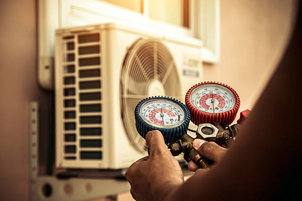 Professional Air Conditioning Service technician working in Barnegat Light, NJ